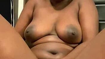 Naughty ebony teases with dildo in creamy hairy pussy. Solo session gets wet and wild.