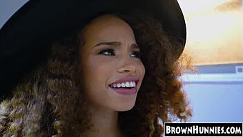 Chocolate teen beauty's petite pussy gets treated in halloween stockings