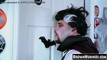 Chocolate teen beauty's petite pussy gets treated in halloween stockings