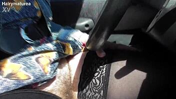 hey, check out this hairy mature flashing in the car