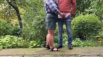 please young man cum on my leather skirt in this outdoor flashing handjob