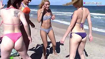 Slutty teens show off asses at the beach and tease with monster cocks in group fun.