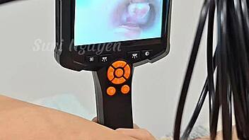 vietnamese girl explores her wet hairy pussy with toys in bedroom closeup.