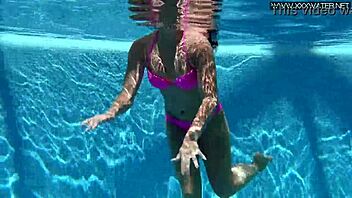 Hey, check out Jessica Lincoln looking amazing in her pink bikini while splashing around in the pool with friends