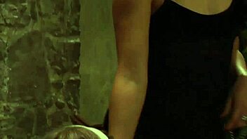 why is this submissive lesbian slave bent over and getting spanked by her dominant madame?