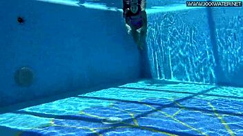 Hey, check out Jessica Lincoln looking amazing in her pink bikini while splashing around in the pool with friends