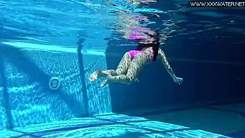 Hey, check out Jessica Lincoln looking amazing in her pink bikini while splashing around in the pool with friends