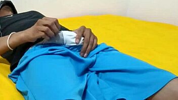 In a quiet moment, a young man indulges in solo self-pleasure.