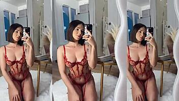 oh wow, sexy babe eve sweet is fucking her tight pussy with a big dildo in that leather suit!