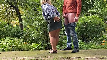 please young man cum on my leather skirt in this outdoor flashing handjob