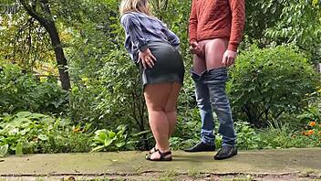 please young man cum on my leather skirt in this outdoor flashing handjob