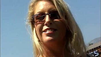 Classy cougar turns naughty outdoors riding big tits in cowgirl fucking.