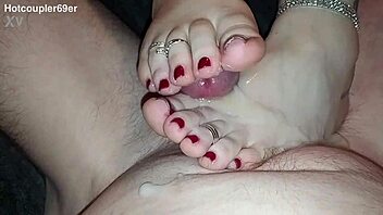 Intense Oiled Footjob Leads to Massive Cumshot