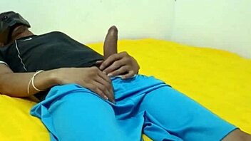 In a quiet moment, a young man indulges in solo self-pleasure.