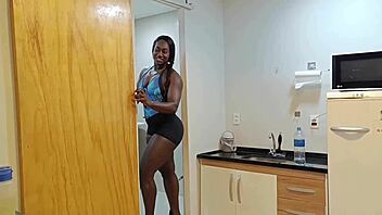 Personal trainer shows neighbor free squat lesson