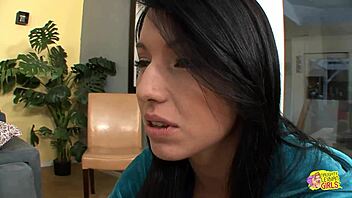 Two brunettes share soft kisses gently