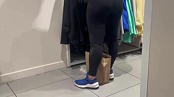 that round latina booty shines through her see-thru leggings in a sneaky voyeur moment