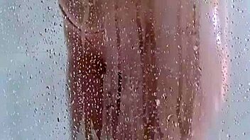 Oh man, I-I can't believe how her butt bounces and those curves shine in this steamy shower vid, totally 18+ only, ya know?