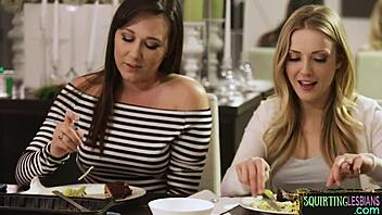 squirting lesbian gets fingered under the table by glamorous big tits girlfriend