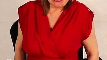 Busty giantess granny towers over tiny guy, playing with her huge natural tits in taboo homemade fun during old and young encounter.