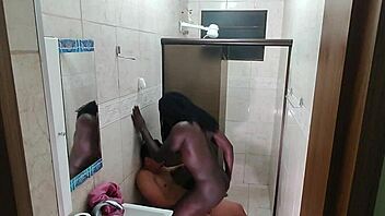 Hidden Camera Captures Ebony Babe Exploding on Young Guy's Dick