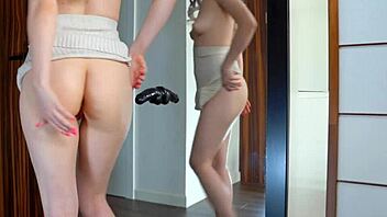 Hot blonde tries sexy skirts while impaling on black dildo in mirror reflection