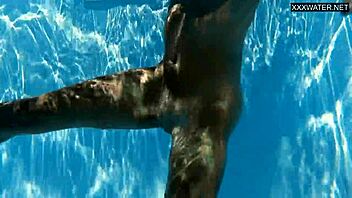 Hey, check out this beautiful big-breasted Hungarian beauty Angelica Heart by the pool! 🌊👙