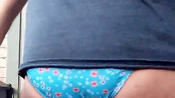 He secretly enjoys slipping into his wife's teasing panties for personal thrill.