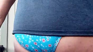 He secretly enjoys slipping into his wife's teasing panties for personal thrill.