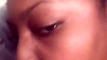 Massive black cock received eager sucking from aroused partner in intimate encounter