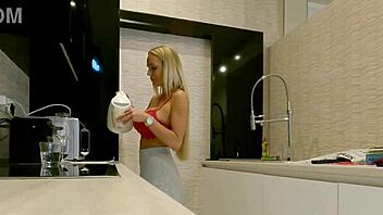 Are those big boobs on that hot blonde housewife in the kitchen without panties?