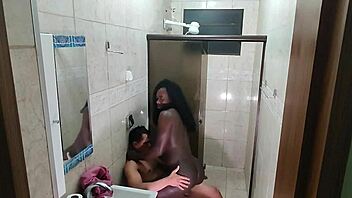 Hidden Camera Captures Ebony Babe Exploding on Young Guy's Dick