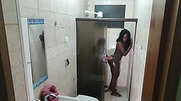 Hidden Camera Captures Ebony Babe Exploding on Young Guy's Dick