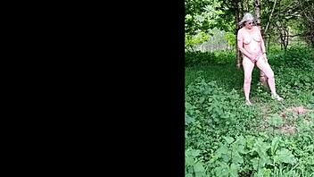 Girl explores nature by wanking outdoors in the forest