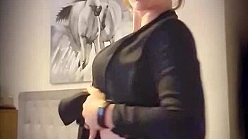 Blonde milf shares a little teaser with undressing moves