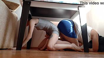 Amateurs Hide Under Desk Rubbing Pussies Passionately In Miniskirts