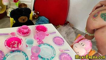 Inked Lesbians Squirting Milk In Messy Anal Enema Fetish