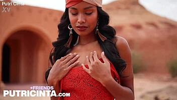 exotic girl putri cinta touches her boobs