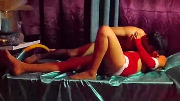 this cute mexican brunette in a sexy dress teases her friend with legs spread in homemade bedroom roleplay for christmas fun.