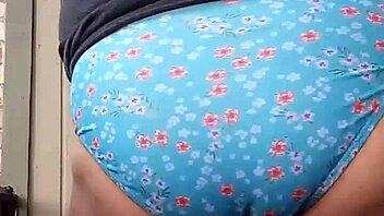 He secretly enjoys slipping into his wife's teasing panties for personal thrill.