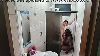 Hidden Camera Captures Ebony Babe Exploding on Young Guy's Dick