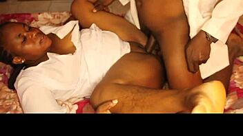 Nigerian nurse handles her patient during a steamy night shift at the hospital.