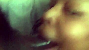 Massive black cock received eager sucking from aroused partner in intimate encounter