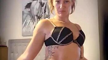 Blonde milf shares a little teaser with undressing moves