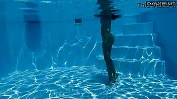 Hey, check out this beautiful big-breasted Hungarian beauty Angelica Heart by the pool! 🌊👙