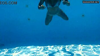 Hey, check out this beautiful big-breasted Hungarian beauty Angelica Heart by the pool! 🌊👙