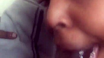 Massive black cock received eager sucking from aroused partner in intimate encounter