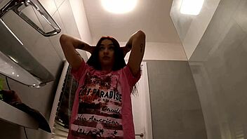 hey, hottest redhead strips t-shirt panties in bathroom!