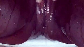 Black milf shaves wet pussy closeup orgasm