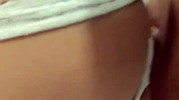 latina slips toy into ass during intimate play session